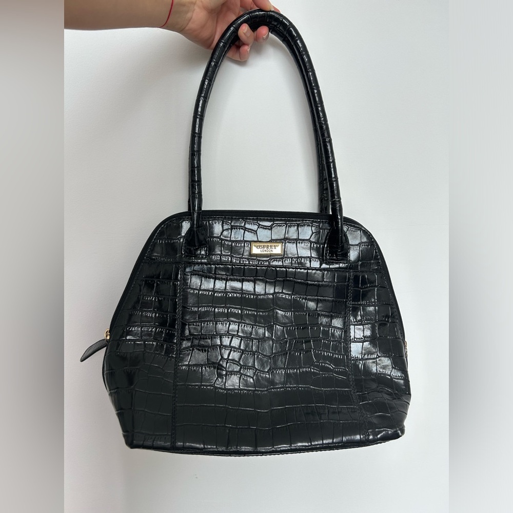 Osprey London , used as new . Bought in Europe
